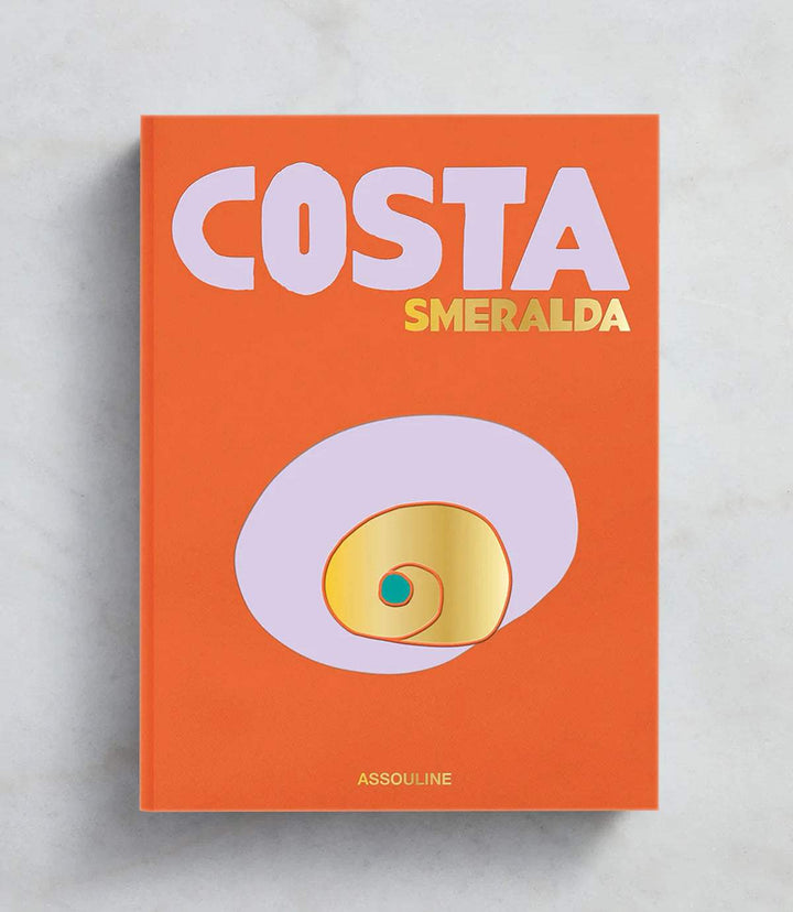Costa Smeralda luxury travel hardcover book with bold orange cover and modern design