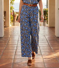 Blue floral wide-leg pants with elastic waist and side pockets for comfortable everyday wear