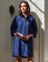 woman wearing blue sequin dress