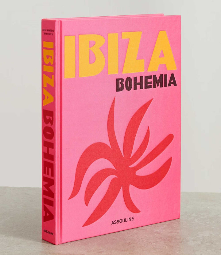 Ibiza Bohemia hardcover coffee table book with pink cover and bold yellow and black text