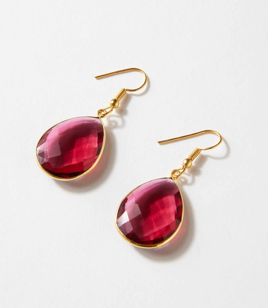 Pink Quartz teardrop earrings with faceted stones set in gold-filled frames and hook closures.