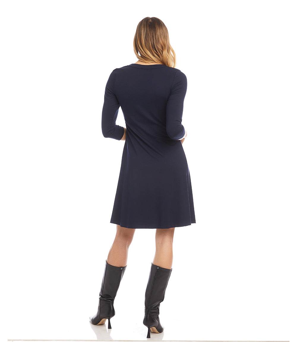 Petite size navy three quarter sleeve A-line dress with scoop neckline and knee-length hem