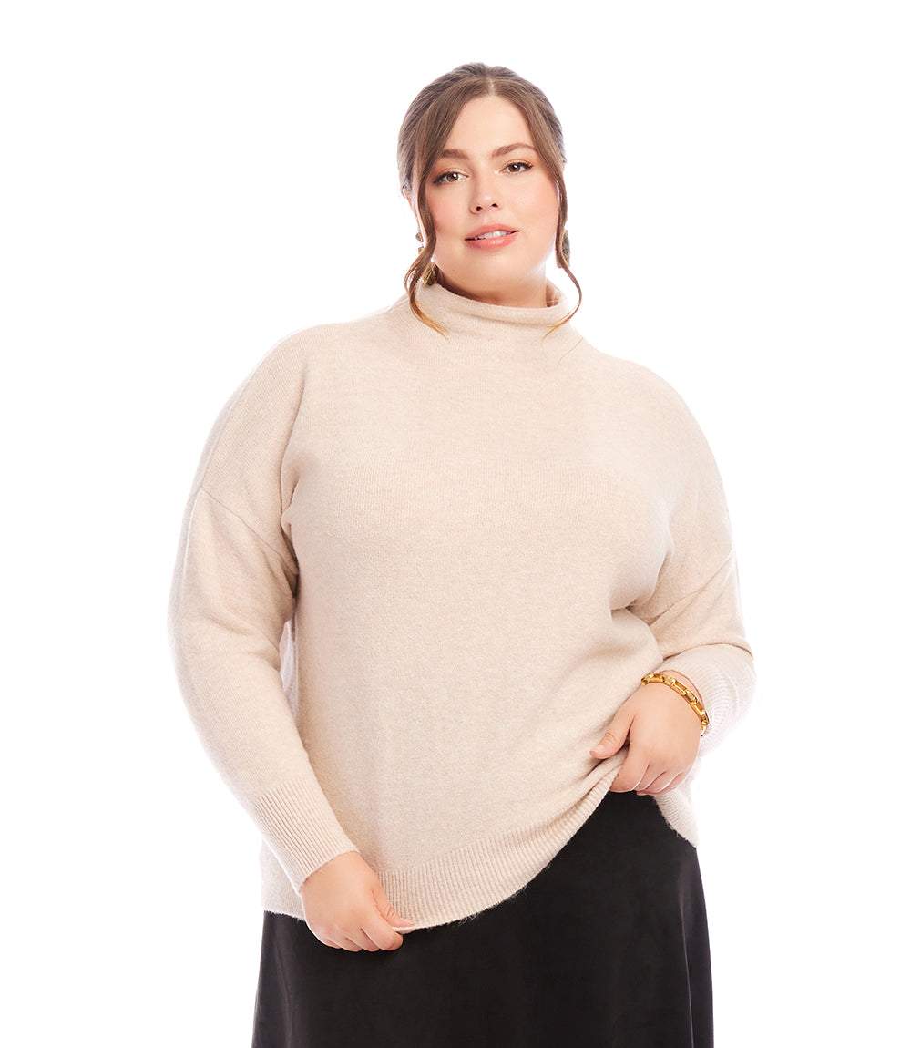 Plus size mock neck sweater in beige with relaxed fit and long sleeves worn by model