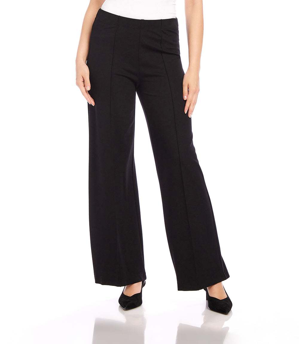 Black Luna Wide Leg Pants with front pintuck detail and elasticized waist, made from stretch ponte fabric for comfort and style.