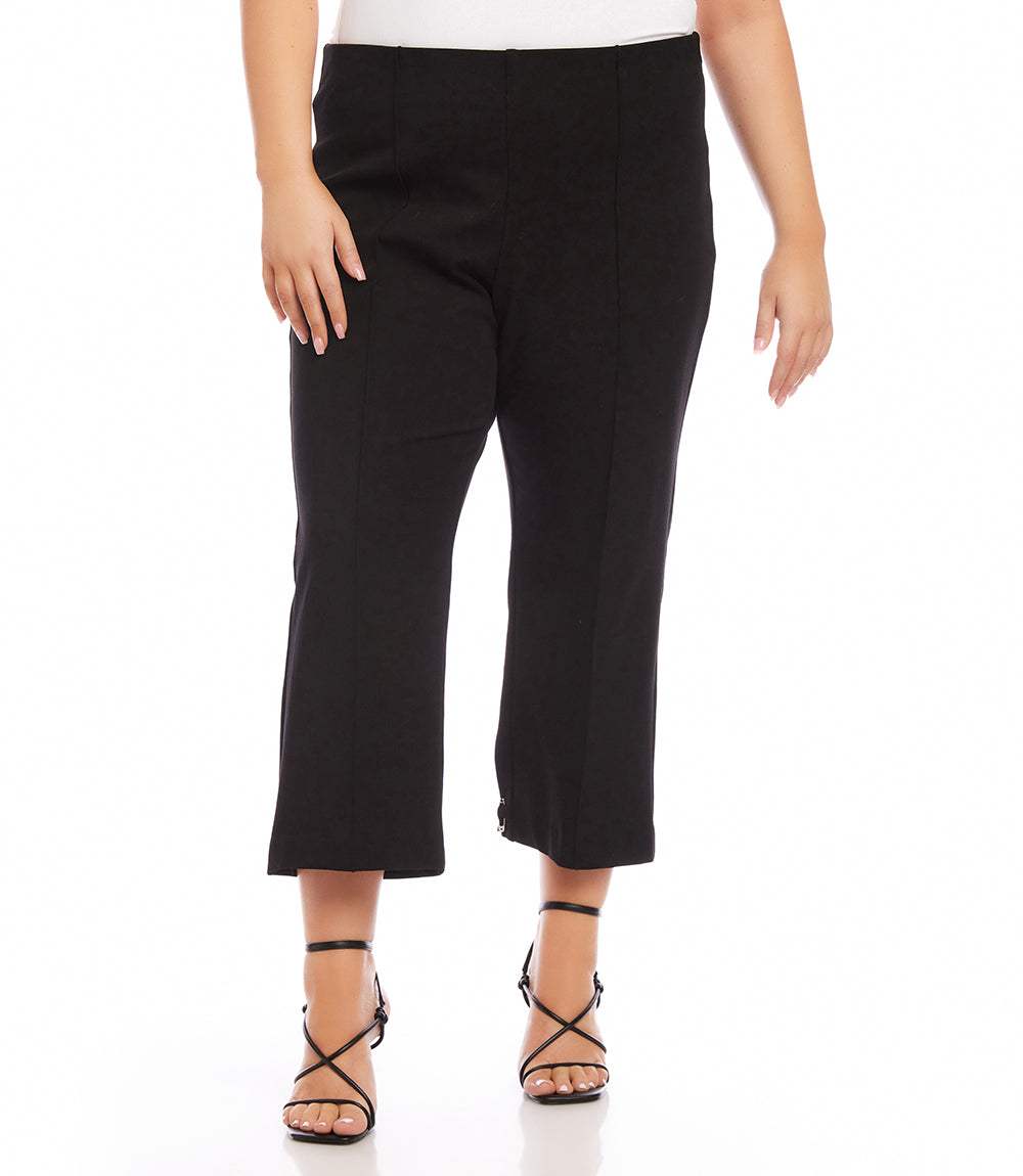 Plus size cropped black pintuck pants with wide leg and high rise, styled with strappy heels