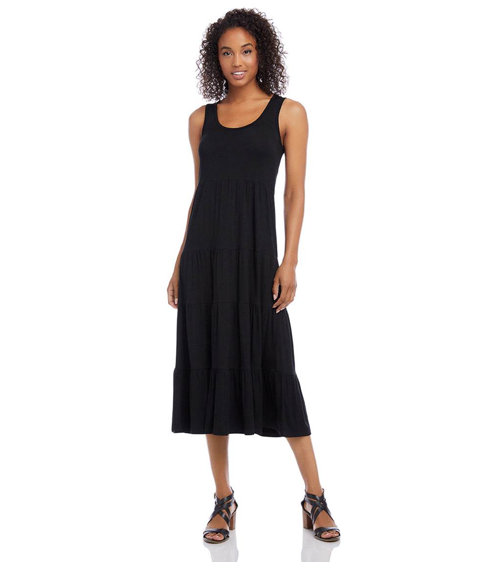 Petite size black tiered midi dress with scoop neckline and sleeveless design made from stretchy rayon spandex jersey