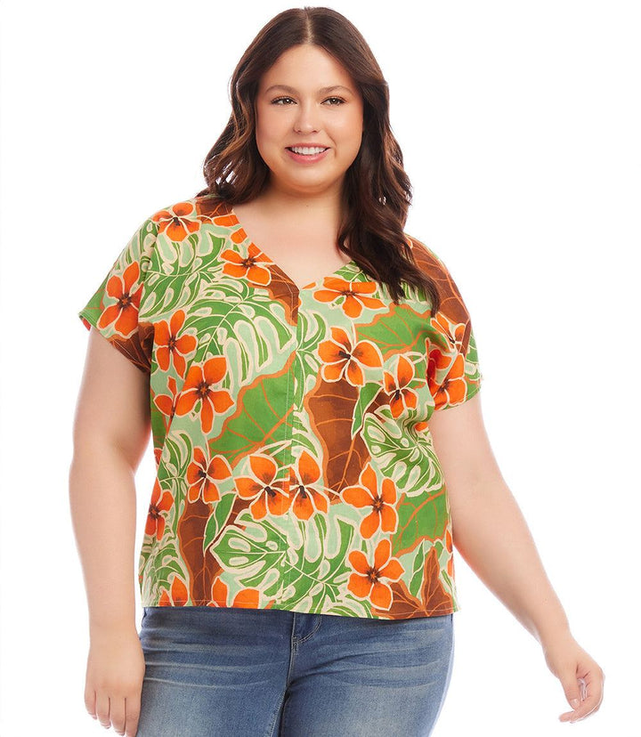 Plus size dolman sleeve top with tropical print in linen-cotton blend, featuring V-neck and relaxed fit
