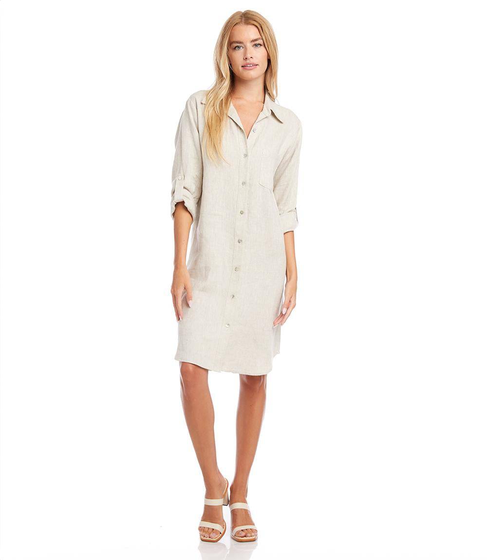 Petite size oatmeal linen shirtdress with roll-tab sleeves, front buttons, patch pocket, and relaxed fit.