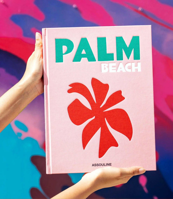 Palm Beach hardcover book by Aerin Lauder featuring a red hibiscus flower on the cover against a colorful background