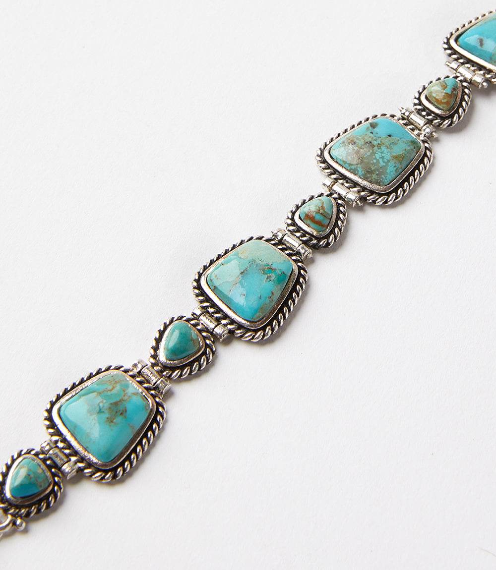 Handcrafted turquoise bracelet with sterling silver twisted wire rope and geometric turquoise stones, 8 inches long