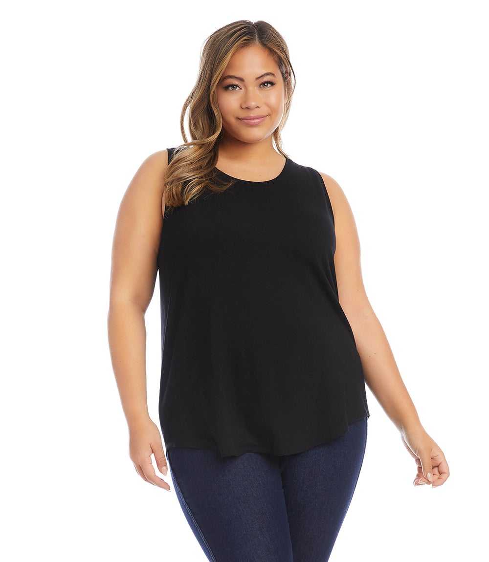 Plus size shirttail tank top in black French terry fabric with relaxed fit worn by model
