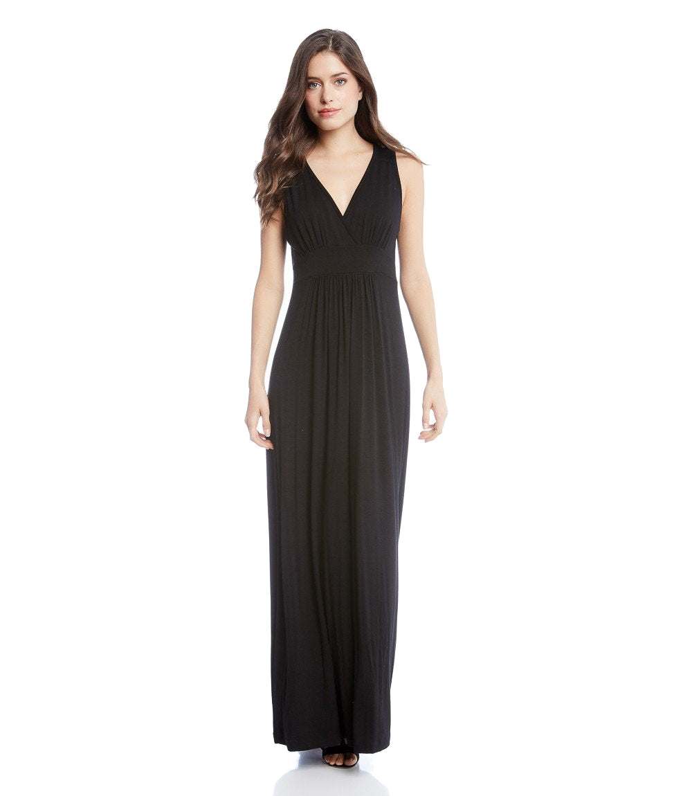 Black sleeveless V-neck maxi dress with empire waist and flowing full-length skirt