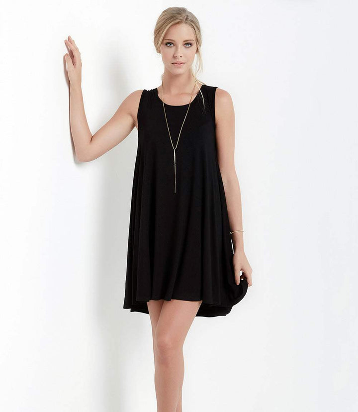 Sleeveless Maggie Trapeze Dress in black with scoop neck and high-low hem, made of soft, stretchy rayon spandex jersey.